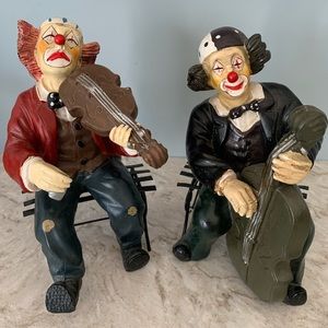 Clowns Playing Instruments on Benches